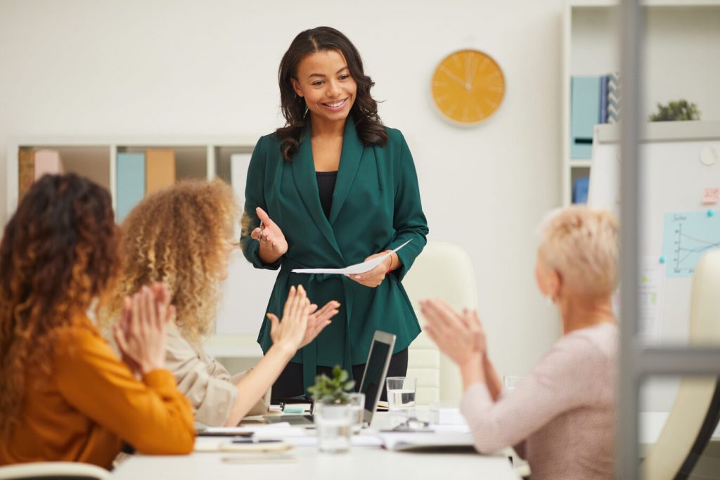 Charming African American Woman Finishing Presentation